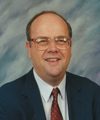 Professional image of Kaplan's subject matter expert J. Michael Pusey