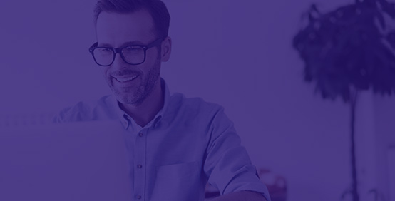 A business professional looking to advance his career with Kaplan's Professional Designations