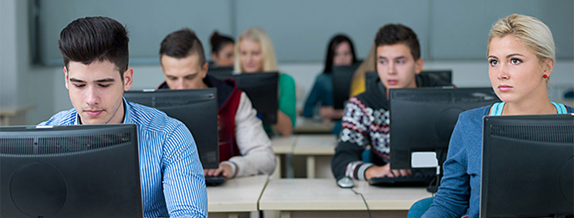 CFA Exam candidates sitting for one of the four yearly exams in the new computer-based format