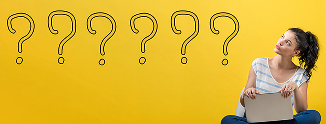 Woman on a chair thinking about the most frequently asked questions about the Level 2 CAIA exam