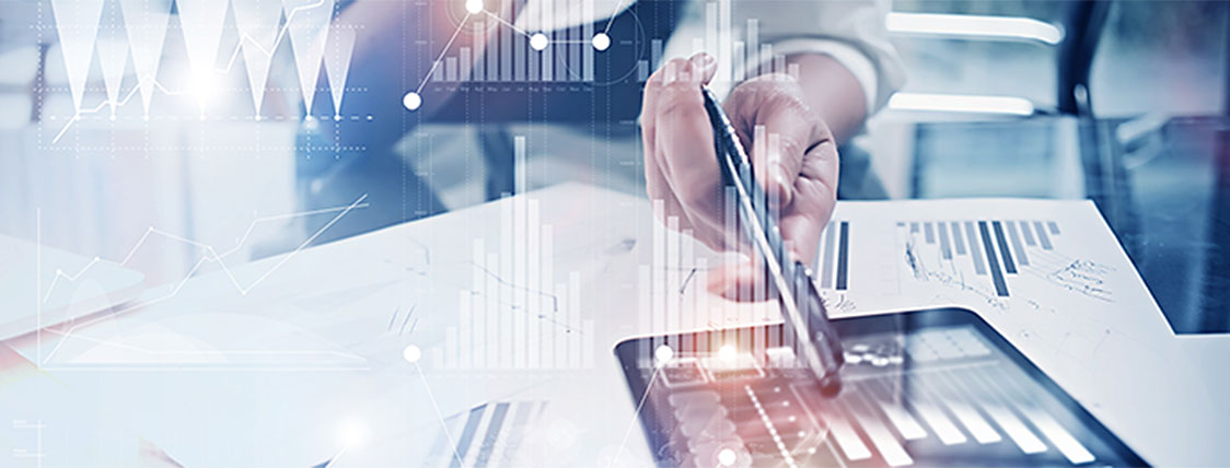 Analyzing financial data on a tablet related to your decision to sit for the CFA exam