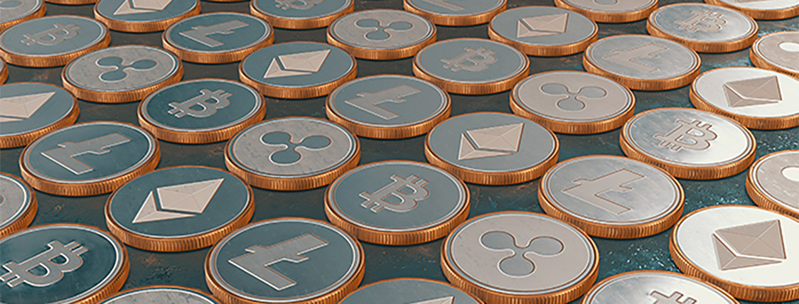 Coins representing cryptocurrency, one of the Fintech topics that will be tested on the CFA Exam