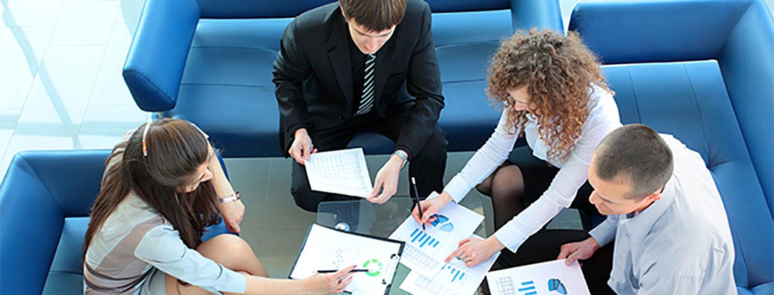 Group of people using CFA study tips and techniques