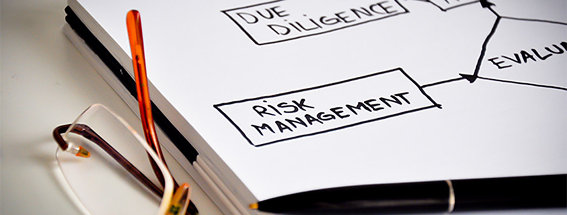 Someone making notes to figure out what the FRM (Financial Risk Manager) Designation is